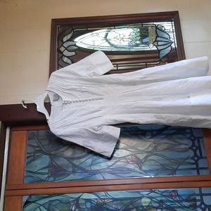 Jason Wu white eyelet dress with working fabric covered buttons, side pockets.